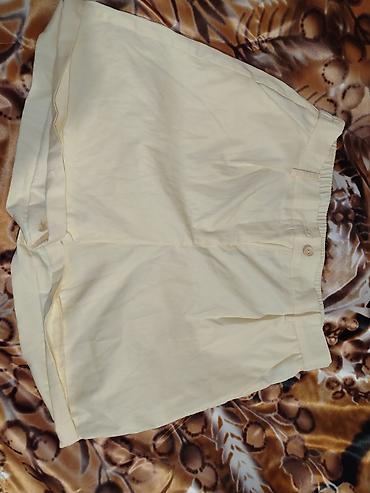idman şort: Acıq sarı rəng şort (skort) - Model: Şort kimi rahat, etek görünüşlü — 2