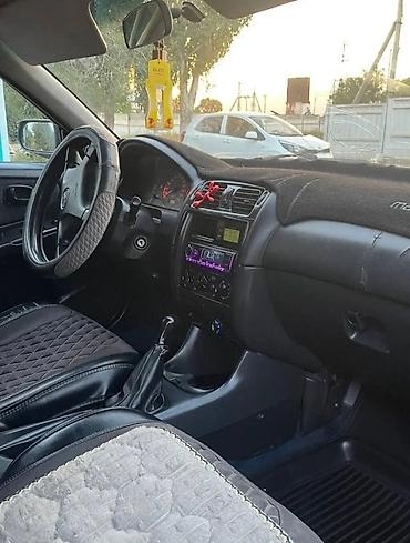 sprinter 315: Mazda Capella: 1999 г., 1.8 л, Механика, Бензин, Седан — 8