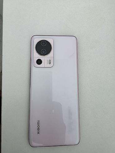 Xiaomi 13 Lite, 128 GB, rəng - Çəhrayı, 
 Sensor, Barmaq izi, Simsiz şarj
