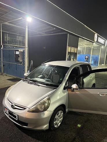 люк 124: Honda Fit: 2003 г., Автомат, Бензин, Хэтчбэк — 2