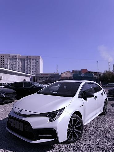 es гибрид: Toyota Corolla: 2021 г., 2 л, Вариатор, Гибрид, Седан — 4