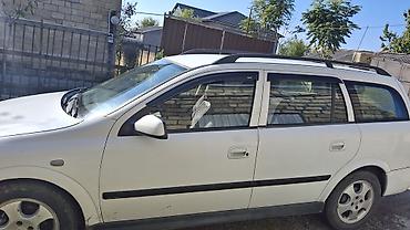 avtomobil kreditlə: Opel Astra Caravan (Universal) – ağ rəngdə, 5 qapı Mühərrik və — 3