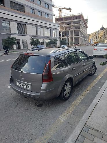 Renault: Renault Megane Grandtour (universal), boz rəng. Əsas xüsusiyyətlər: - — 3