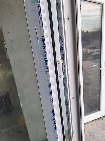 islenmis plastik qapi pencere: PVC pencere Hündürlük 1.9 m / Eni 2.5 m. Teze qoyulub. Deyişiklik — 2
