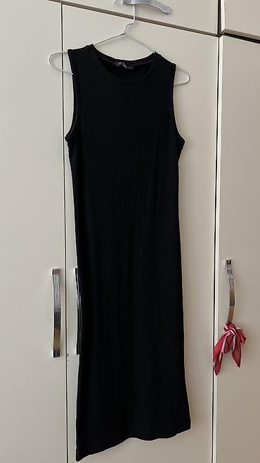Ziyafət donları: - Məhsul: Oversize T‑shirt - Brend/Qrafika: “NEW ERA” mövzulu çap; ön — 21