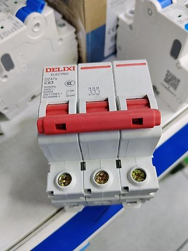 Автоматический выключатель DELIXI Electric DZ47s C63, 3-полюсный -