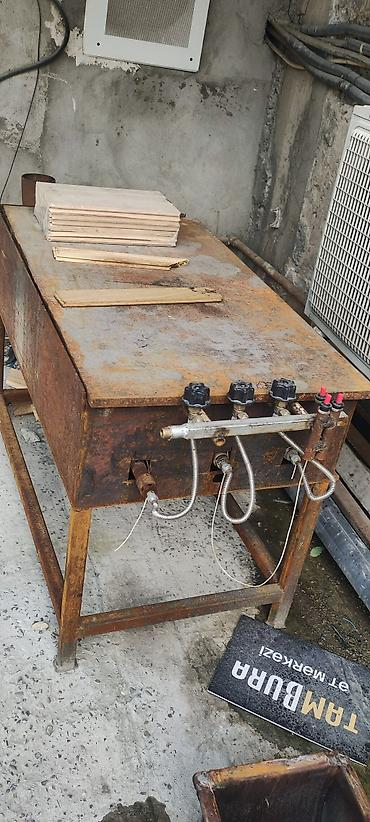 Sənaye tipli qazla işləyən isidici stol - Qalın metal korpus və