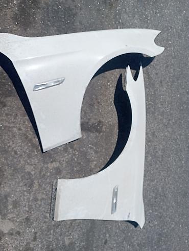 Məhsul: Avtomobil üçün ön qanad cütü - Rəng: Ağ - Material: Metal -