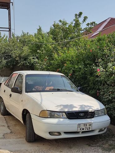 Daewoo: Daewoo Nexia, ağ rəngli sedan. Xarici:heç bir prablemi yoxdur real — 4