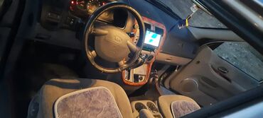 Kia: Kia Carnival: 2005 г., 2.5 л, Автомат, Бензин, Минивэн — 9