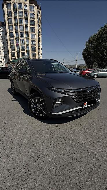 byd e1: Hyundai Tucson: 2022 г., 1.6 л, Автомат, Гибрид, Кроссовер — 1
