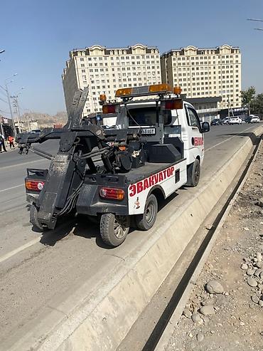 Услуги эвакуатора: По городу днем 2000 сом . Эвакуатор на базе Kia Bongo III. Услуги: - — 4