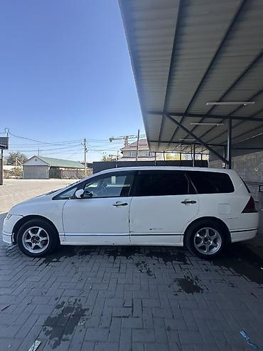 обшивка одиссей: Honda Odyssey: 2004 г., 2.4 л, Бензин, Универсал — 4