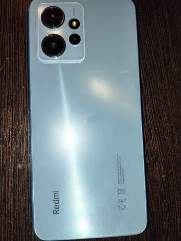 not 4 telefon: Xiaomi Redmi Note 12, 128 ГБ, цвет - Синий, 
 Отпечаток пальца