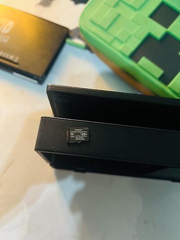 Nintendo Switch: Nintendo Switch (модель с док-станцией) Комплектация: - консоль — 8