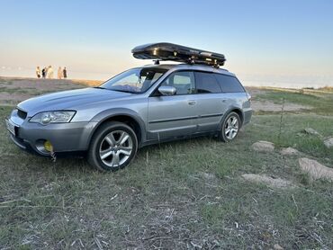 ролики субару: Универсальный внедорожник Subaru Outback серебристого цвета с