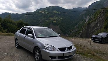 balaca maşın: Mitsubishi Lancer: 1.6 l | 2007 il 280 km Sedan — 1