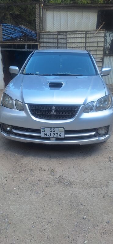 багажник на авто: Mitsubishi Airtrek Turbo – gümüşü rəngli, sport üslublu universaI/SUV