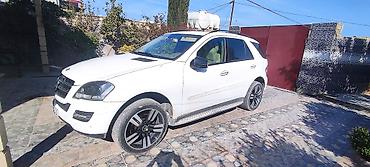 a class mercedes: Mercedes-Benz ML-Class (W164) ağ rəngli krossover/SUV Xarici — 1