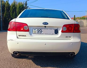 90 fa 373: Kia Optima: 2.7 l | 2008 il Sedan — 2