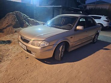 90: Mazda 323: 2000 г., 1.5 л, Автомат, Бензин, Седан — 5