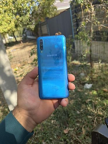 Samsung Galaxy A50, Б/у, 128 ГБ, цвет - Синий, 2 SIM