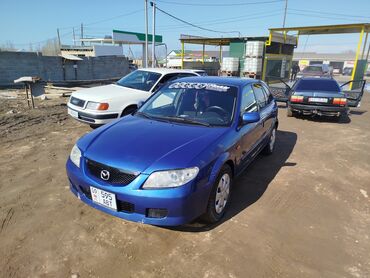 Mazda: Mazda 323: 2002 г., Хэтчбэк