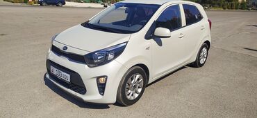 срочно продам авто в связи с переездом: Бежевый городской хэтчбек Kia Morning. Автомобиль оснащен пятидверным