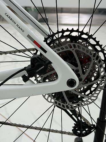 Городские велосипеды: Велосипед TWITTER LEOPARD PRO Карбон. 29”. Shimano Deore 12S — 11