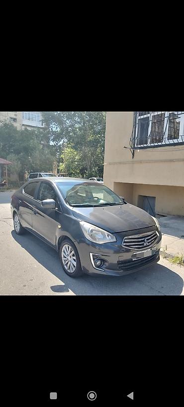 isma mirage: Mitsubishi Attrage sedan - Kuzov: 4 qapılı sedan, tünd boz rəng - — 2