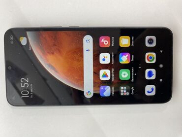 дополнительный свет: Смартфон Xiaomi Redmi в чорному корпусі з безрамковим екраном та
