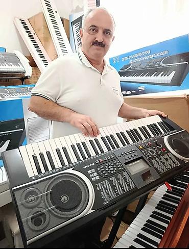 мини пианино: Sintezator. Təzə. Qutuda 5 oktava 61 klaviş Pianino səslidir. Əlavə — 6