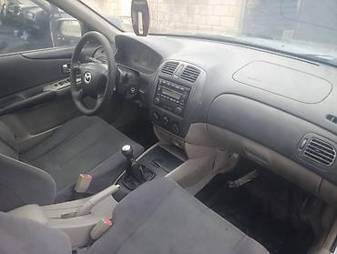 Mazda: Mazda 323: 2001 г., 2 л, Механика, Дизель — 9