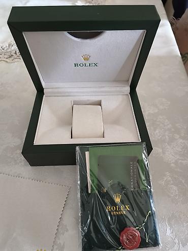Аксессуары: Lüks saat qutuları və aksesuar dəsti Tərkib: - Rolex yaşıl rəngli — 2