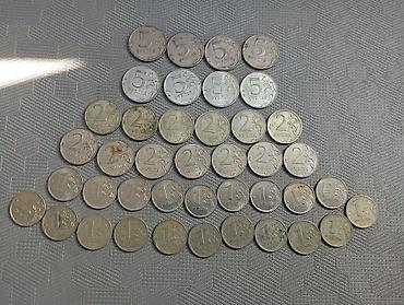 Монеты: Набор жетонов и монет: - 2 жетона «Евромойка» для автомойки — 9