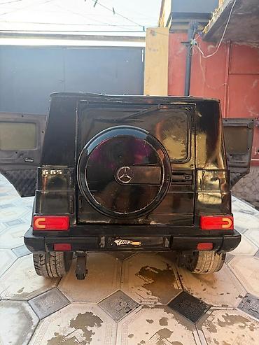 oyuncaq masin type 1 per page 40: Uşaq elektro avtomobili – Mercedes-Benz G65 AMG (qara) — 2