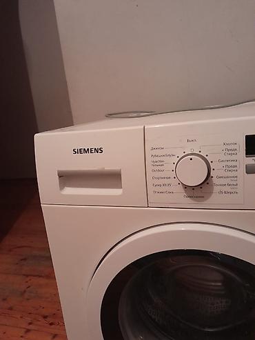 simens: Siemens iQ300 ön yükləməli paltaryuyan maşın - Baraban həcmi: 7 kq - — 2