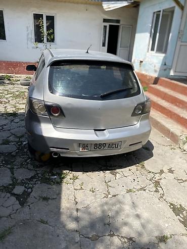 bud e9: Mazda 3: 2004 г., 2 л, Механика, Бензин, Хэтчбэк — 4