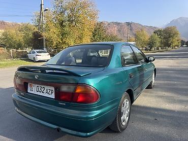 плуг для мтз трактора: Mazda 323: 1997 г., Механика, Бензин, Седан — 5