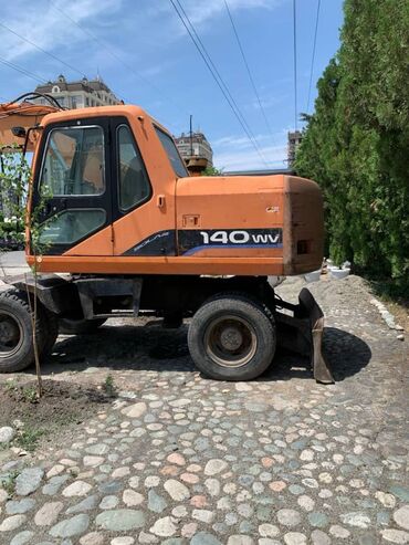 экскватор сатылат: Экскаватор, Doosan, 2005 г., Дөңгөлөктүү