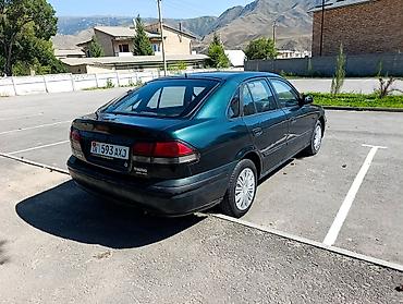 385 55: Mazda 626: 1997 г., 1.8 л, Механика, Бензин, Седан — 5