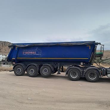 Самосвальный полуприцеп Schmitz Cargobull (трехосный) дисковый -