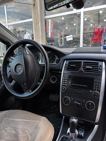 мерседес ешка: Mercedes-Benz B-Class (W245) – ağ rəngli kompakt minivan/hetçbek — 7