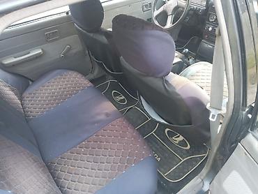 kia clarus 1997: Avtomobil: 4 qapılı sedan Rəng: Tünd boz Yanacaq: Benzin Ötürücü — 6