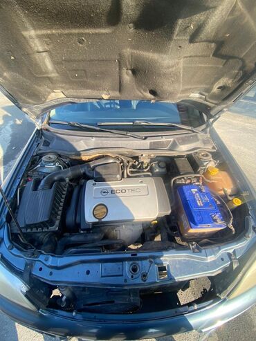 Opel: Model: Opel Astra Caravan (universal kuzov) Rəng: tünd boz Yanacaq — 4