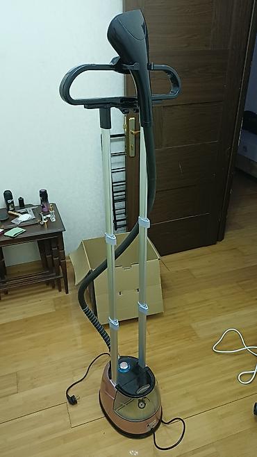 televizor 82 ekran: Geyim buxarlayıcısı (dikey steamer) Xüsusiyyətlər: - Güclü davamlı — 5
