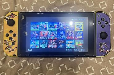 oyun seti: Nintendo Switch (Neon Joy‑Con + Splatoon temalı ön panellər) seti — 2