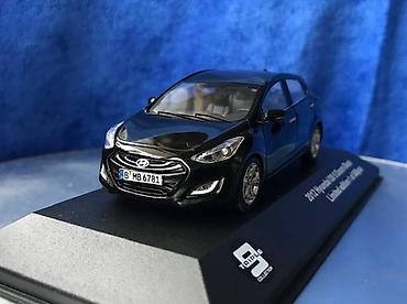 Avtomobil modelləri: Коллекционная модель Hyundai i30 5 door black 2012 Limited Edition — 12