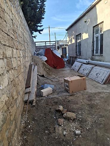 Daşınmaz əmlak: Mawdagada 4 stda 4 otaq metbex studiya qaraji var heyetinde 20 ye — 9