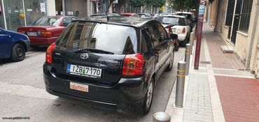 Transport: Toyota Corolla: 1.4 l | 2006 year Hatchback